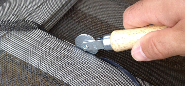 metal screen door repair in Iona